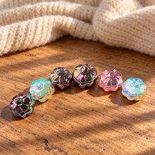 Load image into Gallery viewer, Rainbow aura pumpkin carvings on worn wood with soft cream knit