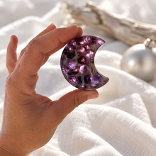 Load image into Gallery viewer, Polished chevron amethyst crescent bowl held in hand for scale