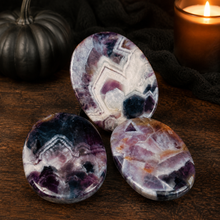 Load image into Gallery viewer, Dream Amethyst palmstones in a Halloween collector's study