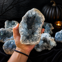 Load image into Gallery viewer, Ethically Sourced CELESTITE Clusters, 5.5 lbs - 10 lbs! in a Halloween setting