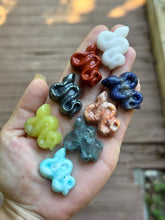 Load image into Gallery viewer, Eight assorted miniature mixed crystal snake carvings held in hand