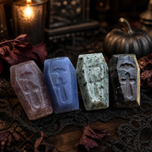 Load image into Gallery viewer, Assorted crystal coffin carvings styled in a moody Halloween scene