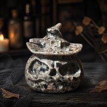 Load image into Gallery viewer, Polished gray Yooperlite pumpkin with witch hat in a dark Halloween product scene