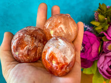 Load image into Gallery viewer, red hematoid quartz CRYSTAL palm stones with RAINBOWS