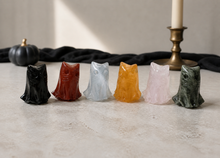 Load image into Gallery viewer, Six crystal cat ghost figurines standing in a Halloween tabletop setting
