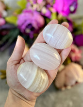Load image into Gallery viewer, Pink Calcite Palm Stones, UV Reactive, Glows Pink, Fluorescent Minerals
