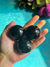 Load image into Gallery viewer, Black Tourmaline Crystal Spheres, Ethically Sourced Crystals, Protection Stone

