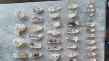 Load and play video in Gallery viewer, Firefly Petroleum Quartz Specimens from Madagascar
