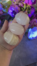 Load and play video in Gallery viewer, Pink Calcite Palm Stones, UV Reactive, Glows Pink, Fluorescent Minerals
