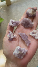 Load and play video in Gallery viewer, Tombstone Arizona fluorite specimens shown from multiple angles in natural light
