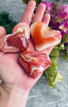 Load and play video in Gallery viewer, Ethically Sourced Carnelian Crystal Hearts | Polished Natural Carnelian
