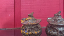 Load and play video in Gallery viewer, Muted video showing Yooperlite pumpkin carvings under UV light
