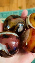 Load and play video in Gallery viewer, Sardonyx Banded Agate Madagascar Polished Crystal Sphere
