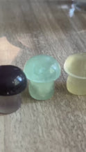 Load and play video in Gallery viewer, Candy fluorite mushroom carvings fluorescing blue and purple under UV light
