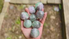 Load and play video in Gallery viewer, 1 1/2&quot; Fluorite Spheres, Green Fluorite, Purple Fluorite and Bicolor Fluorite
