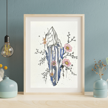 Load image into Gallery viewer, Framed artwork of a crystal and flowers on a wall with decorative vases and a light bulb.
