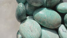 Load and play video in Gallery viewer, ETHICALLY SOURCED Amazonite palm stone for COURAGE
