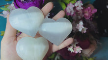 Load and play video in Gallery viewer, 2 1/2&quot; Sweet Satin Spar Hearts
