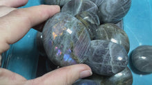 Load and play video in Gallery viewer, Ethically Sourced Purple Labradorite Crystal Palmstones
