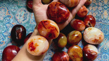 Load and play video in Gallery viewer, Ethically Sourced carnelian crystal Palm Stone
