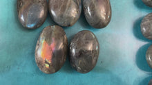 Load and play video in Gallery viewer, Rainbow Purple Labradorite Palm Stone, Ethically Sourced Spectrolite Crystals

