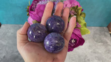 Load and play video in Gallery viewer, Amazing 1 1/2&quot; Charoite Crystal Spheres
