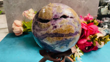 Load and play video in Gallery viewer, HUGE Rainbow Polished FLUORITE crystal sphere
