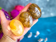 Load image into Gallery viewer, Golden Healer Palm Stones (also known as Yellow Hematoid Quartz)
